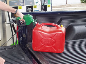 Gas can being filled imroperly on plastic bed liner