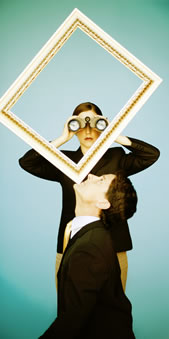 Woman looking through binoculars