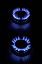 two flaming stove burners