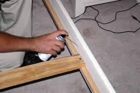 applying aerosol dust to a bed frame